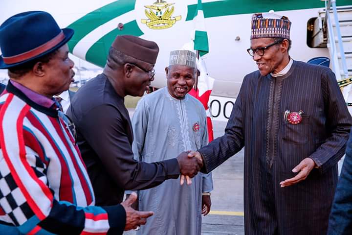 Buhari back home from Paris Peace Forum