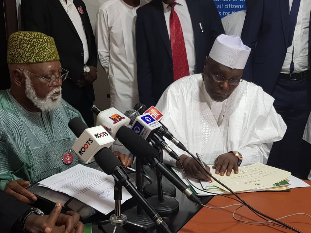 2019: Atiku signs National Peace Accord Agreement