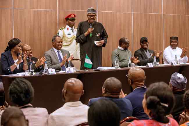 Buhari breaks silence on claim of being cloned
