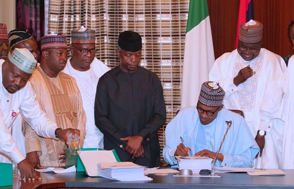 Buhari signs 2019 Appropriation Bill of N8.92 trillion into law