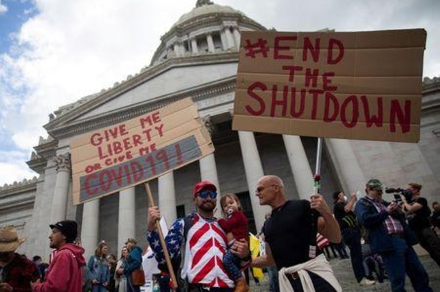 U.S. protests call for lifting coronavirus restrictions as governors push back