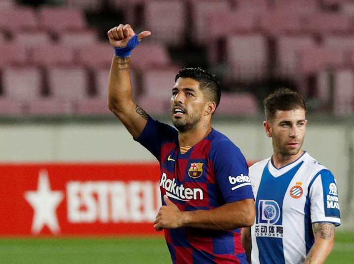 Suarez scores as Barca condemn neighbours Espanyol to relegation