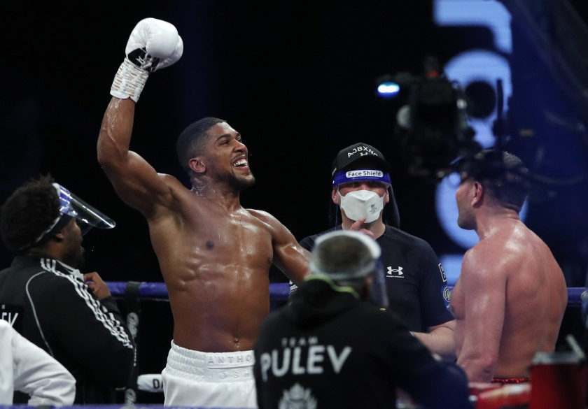 Joshua knocks out Pulev to retain heavyweight titles