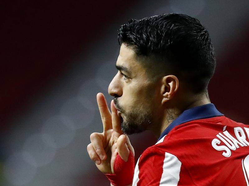 Suarez brace helps Atletico Madrid go 10 points clear in La Liga