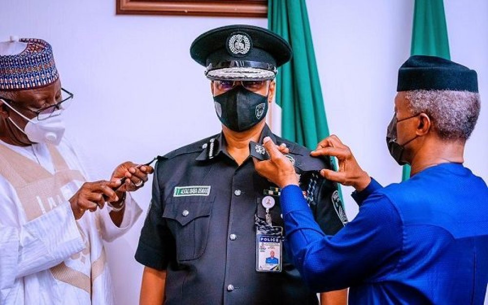 Vice President Osinbajo decorates Usman Alkali Baba as IGP