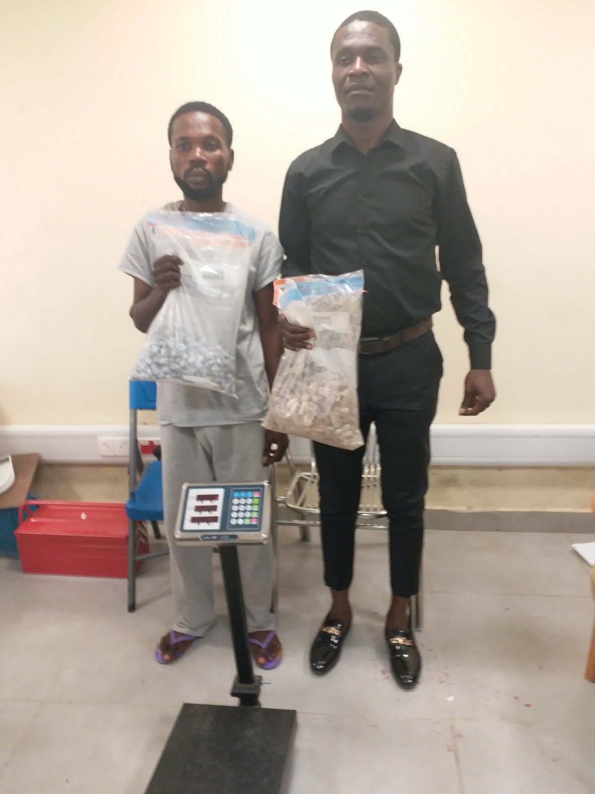 Wanted drug dealer caught in church, another excretes 68 wraps of heroin