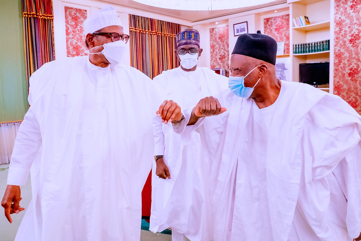 Buhari formally receives new APC chairman, tasks him to be fair, firm