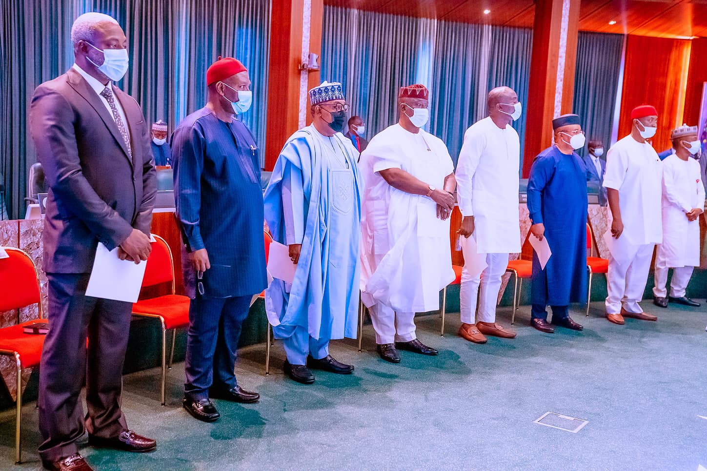 Serve the nation diligently, Buhari charges new ministers, re-assigns others