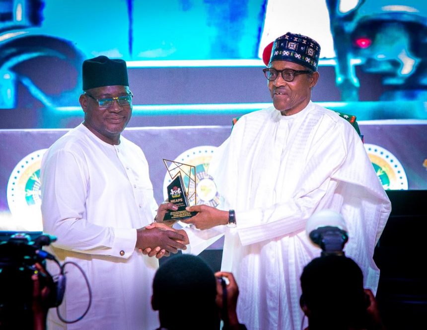 Buhari confers public service award on FIRS boss, Nami
