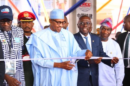 Buhari inaugurates Lagos Blue Rail Line, takes train ride