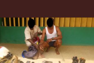 Police arrest two land grabbers, recover guns, charms