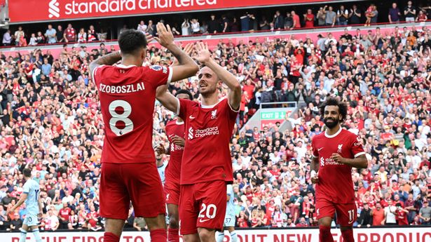 10-man Liverpool in comeback win over Bournemouth