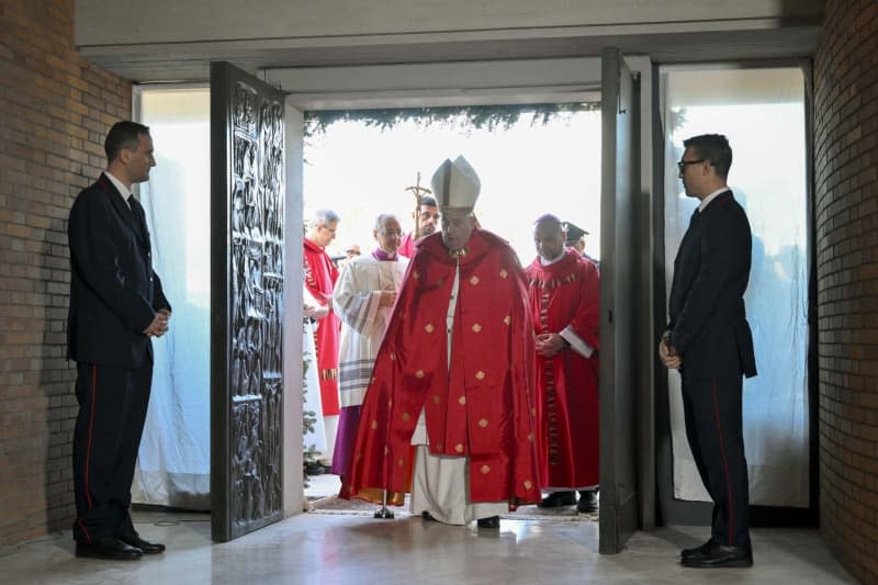 Pope Francis opens symbolic Holy Door in Rome prison