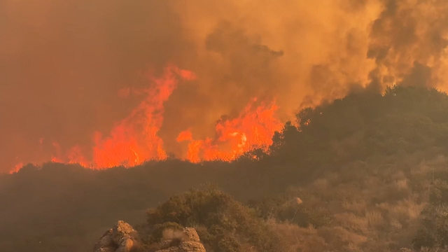 Thousands evacuated as fast-growing fire ignites near Los Angeles