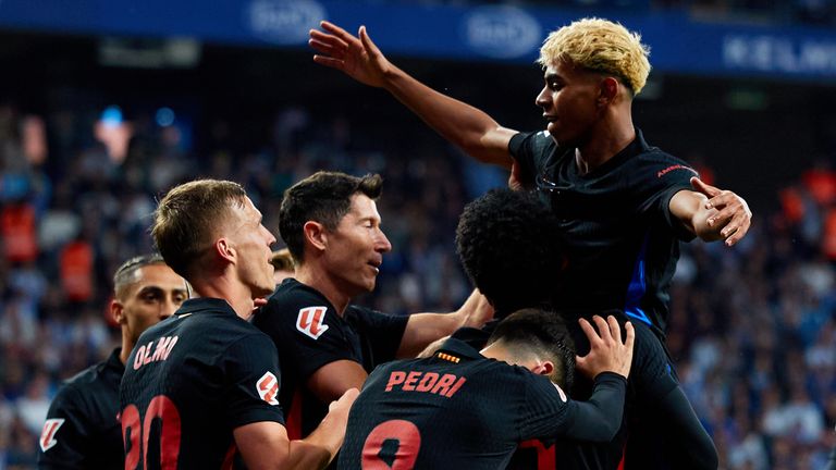 Barcelona clinch La Liga title with victory at Espanyol