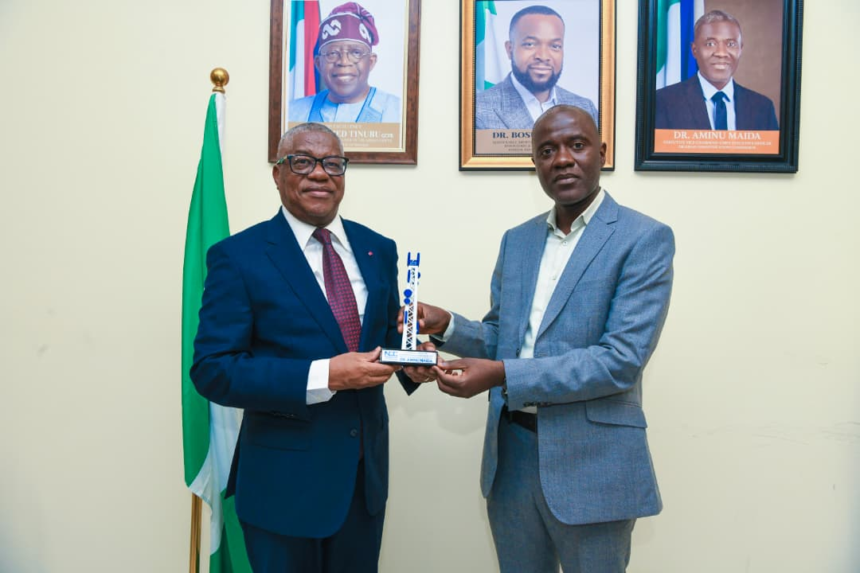 PHOTO NEWS: Cameroon’s Zame, NCC’s Maida meet in Abuja