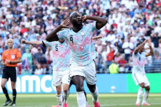 Belgium thrash USA 4-1 to reach quarter-finals amid Balogun row