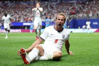 World Cup: Kane’s late brace fires England into last round of 16