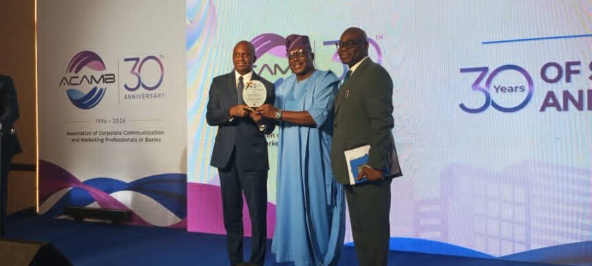 PHOTO NEWS: Ademosu receives ACAMB's Award of Excellence