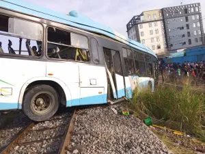 Two killed, many injured as train rams into Lagos staff bus(+Photos)
